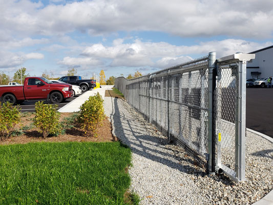Automated gate system installed outside of business parking lot