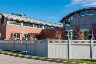 White vinyl fencing installation on UCONN campus