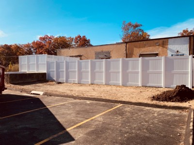 White vinyl fence installation